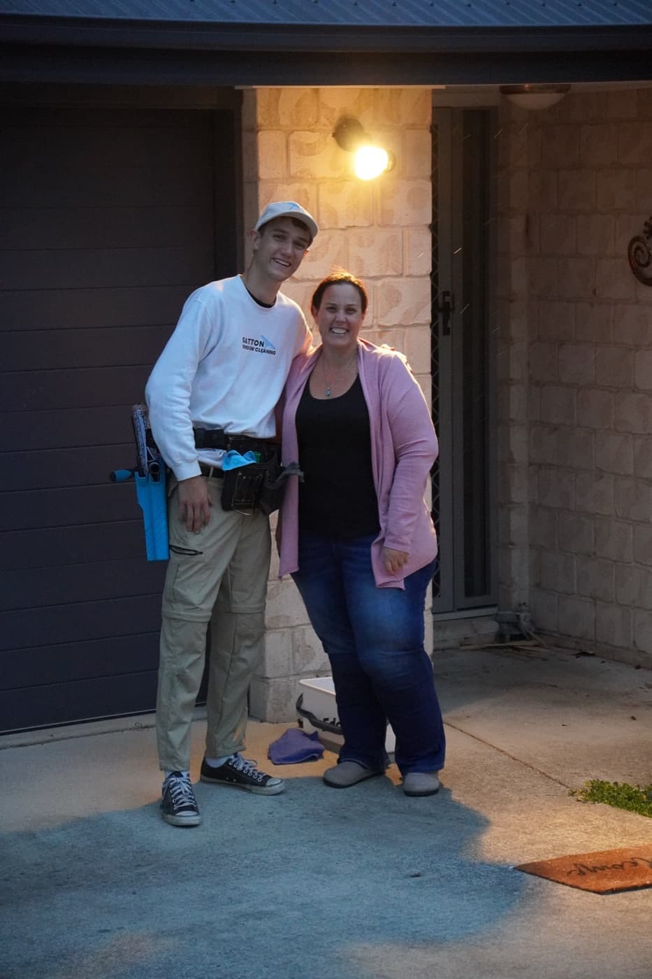 A happy Gatton Window Cleaning customer with Xavier after a clean